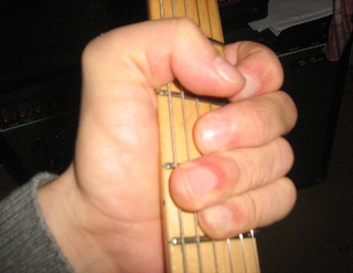 Bild "Solo-Gitarre:muting_finger_02.jpg"