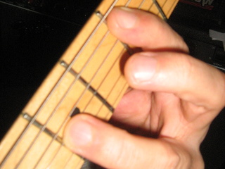 Bild "Solo-Gitarre:muting_finger_03.jpg"